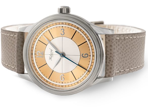 The Massena LAB x Habring² ERWIN LAB02 is a three-hand timepiece with a contrast silver and rose gold sector dial. The stainless steel case is polished with a step bezel that frames a sector dial that recalls the legendary sector dials from the 1930s.