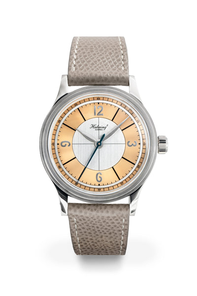 The Massena LAB x Habring² ERWIN LAB02 is a simple, three-hand timepiece with a contrast silver and rose gold sector dial.