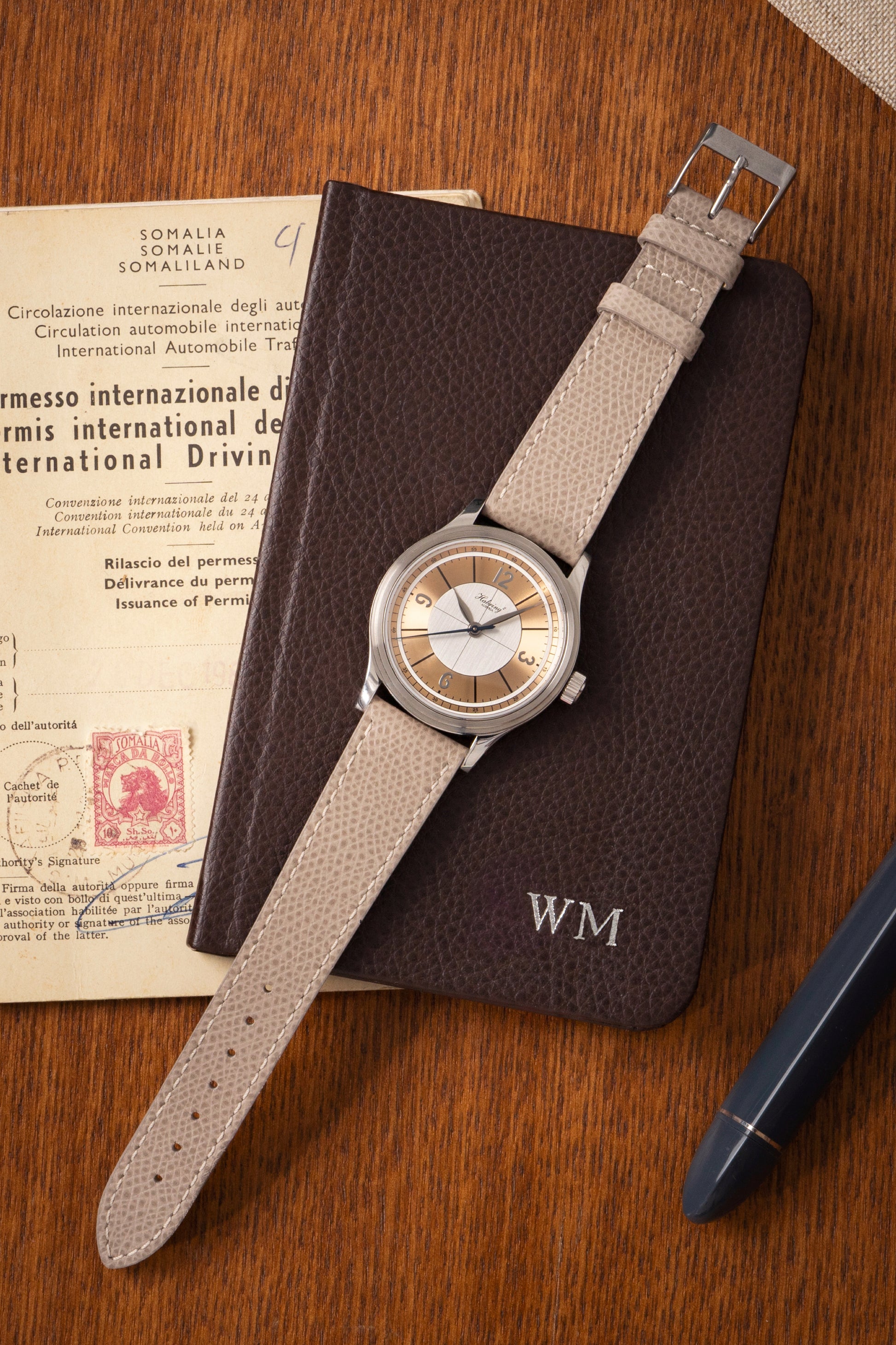 On its dial, the Massena LAB x Habring² ERWIN LAB02 is a simple, three-hand timepiece with a contrast silver and rose gold sector dial.